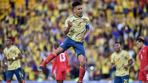 Radamel Falcao celebrates after scoring from the spot in Colombia's 3-0 ...