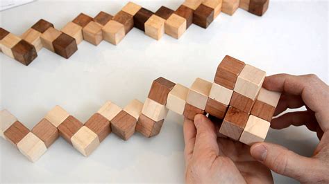 joinery - Joining 3 wooden cubes with swivel joints - Woodworking Stack Exchange