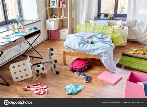 Messy home or kids room with scattered stuff Stock Photo by ©Syda ...