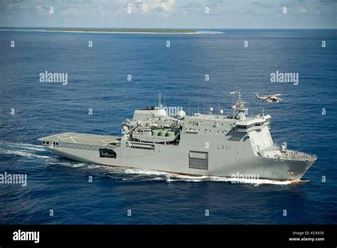 The Royal New Zealand Navy Protector-class amphibious sealift vessel HMNZS Canterbury steams ...