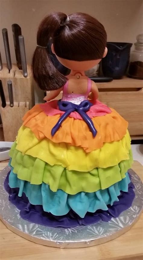 Dora Doll Fondant Ruffled Rainbow Cake - CakeCentral.com