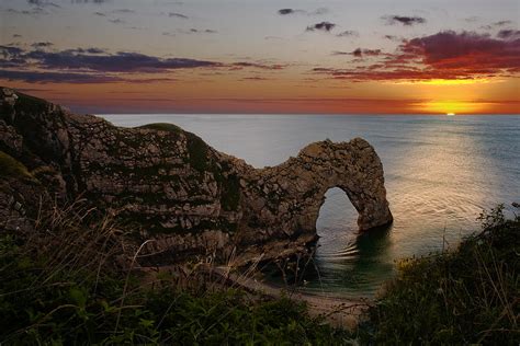 Durdle Door Sunset Photograph by Kris Dutson - Pixels