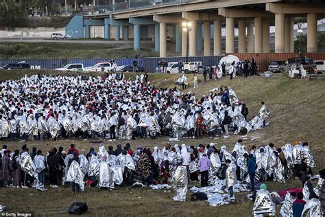 Christmas chaos in Eagle Pass as THOUSANDS more migrants cross US border into Texas