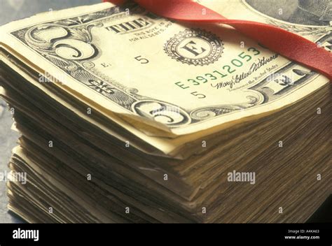 stack of five dollar bills US Stock Photo - Alamy