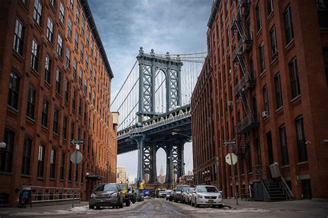 Manhattan Bridge Towering Over Dumbo Brooklyn Photograph by Daniel ...