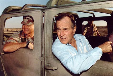 Norman Schwarzkopf, Jr. and President George H. W. Bush visiting troops during the Gulf War ...