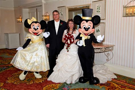 Celebrating with Mickey and Minnie. | Mickey and minnie wedding, Disney ...