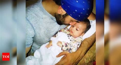 This picture of Ranbir Kapoor holding a baby is too cute to handle ...