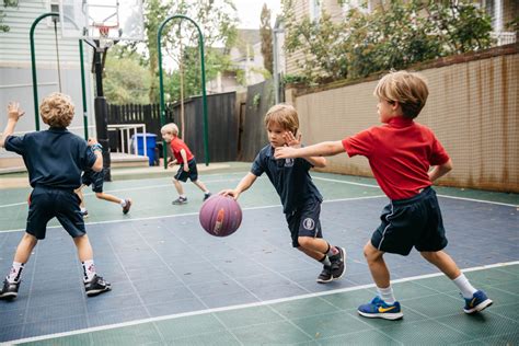 students-playing-basketball-dribble - Charleston Day School