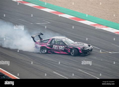 Toyota Supra with pink vinyl drifting Stock Photo - Alamy