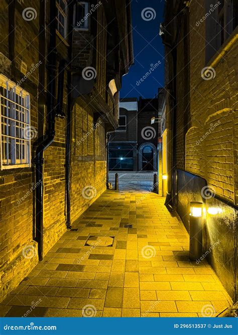 Tudor Wooden Framed Building on a Dimly Lit Street at Dusk in England ...