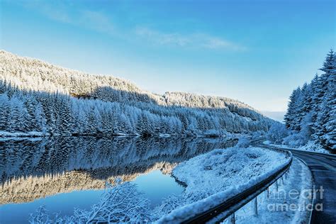 Snowy Reflections In The Scottish Highlands Photograph by Massimo Schianchi | Fine Art America