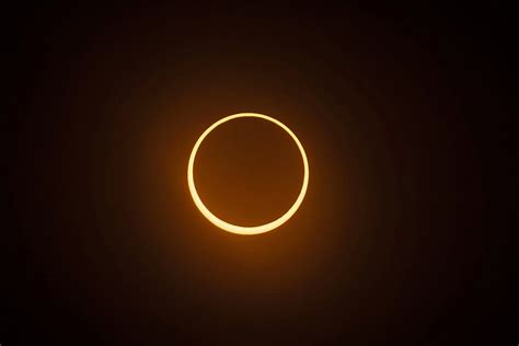 ‘Ring of fire’ eclipse brings cheers and shouts of joy as it moves ...