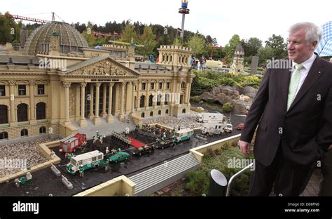 Premier of Bavaria Horst Seehofer (CSU, R) views a Lego model of the German Reichstag at ...