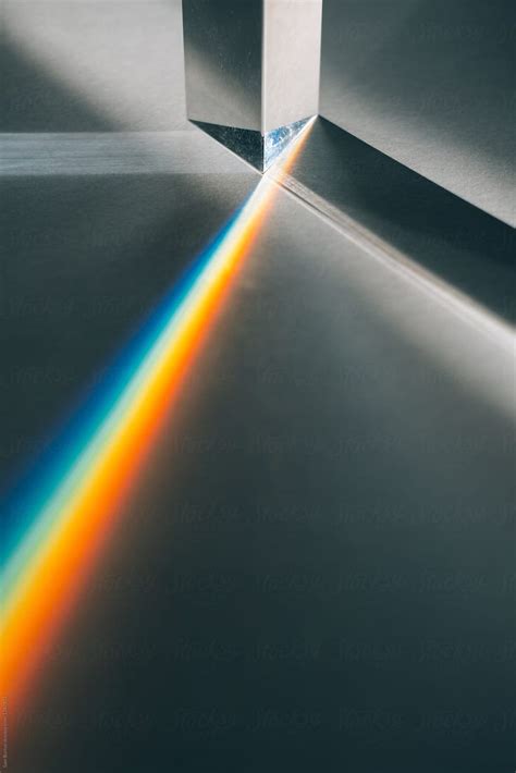 an image of a rainbow beam coming out of a box with the light shining through it