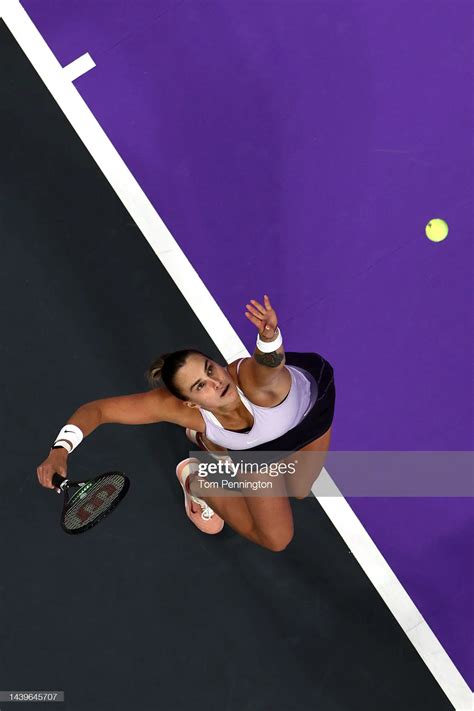 Aryna Sabalenka of Belarus serves against Iga Swiatek of Poland in ...