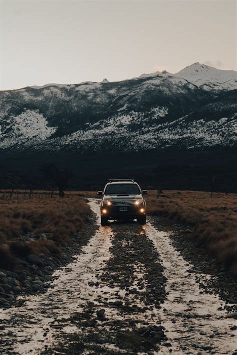 A Car on Dirt Road · Free Stock Photo