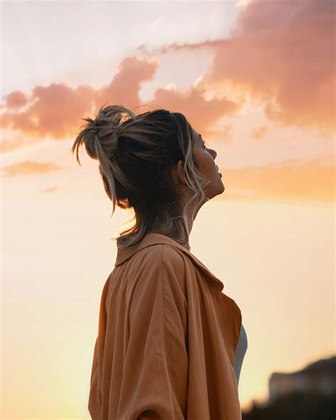 Woman Looking Towards the Sky · Free Stock Photo