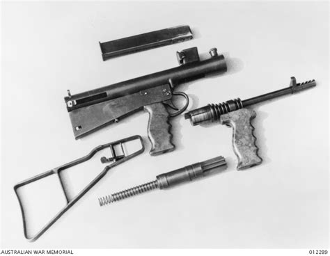 THE VARIOUS PARTS OF AN OWEN GUN. THESE FIT TOGETHER BY SIMPLE BAYONET CATCHES. SINCE OWEN GUNS ...