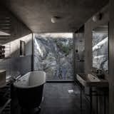 Photo 5 of 7 in A Shipping Container Home Rises on a Rocky Site Outside ...
