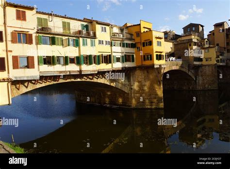 Ponte Vecchio, segmental arch bridge over the Arno river Stock Photo ...