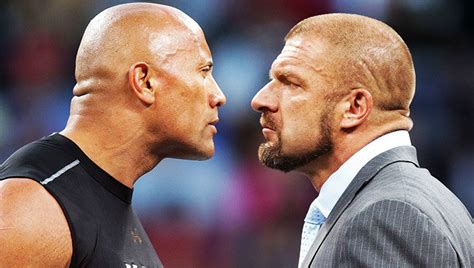 Looking At The 20-Year Feud Between The Rock And Triple H