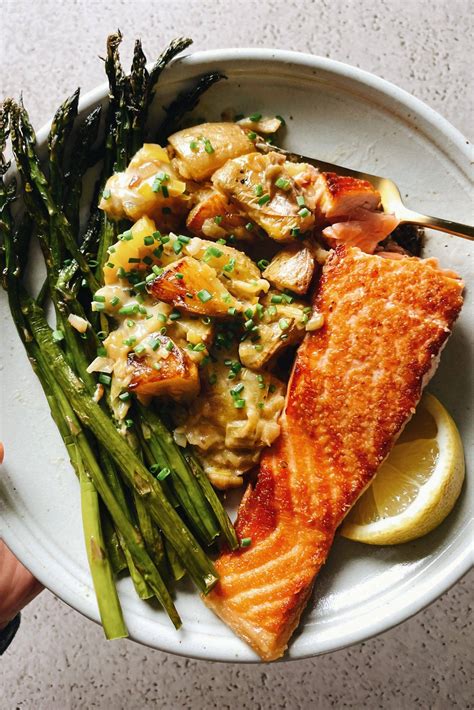 Spring Salmon with Creamed Leeks, Potatoes, and Asparagus Recipe - Pinch of Yum