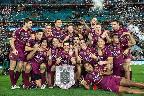 Queensland Maroons celebrating with the 2013 State of Origin Shield ...