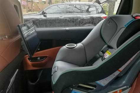 How Do Car Seats Fit in a 2023 Kia Carnival? | Cars.com