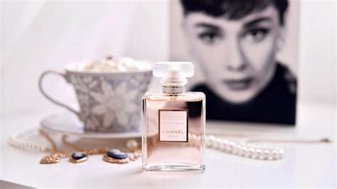 coco chanel perfume on table with cup and chains in white background hd chanel Wallpapers | HD ...