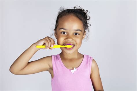 Young girl brushing teeth – Inspire Dentistry – Family Dentist ...