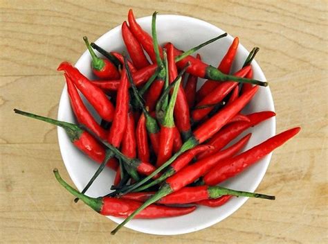 Learn more about Thai chili peppers including the Bird's Eye chili. See where to find them, tips ...