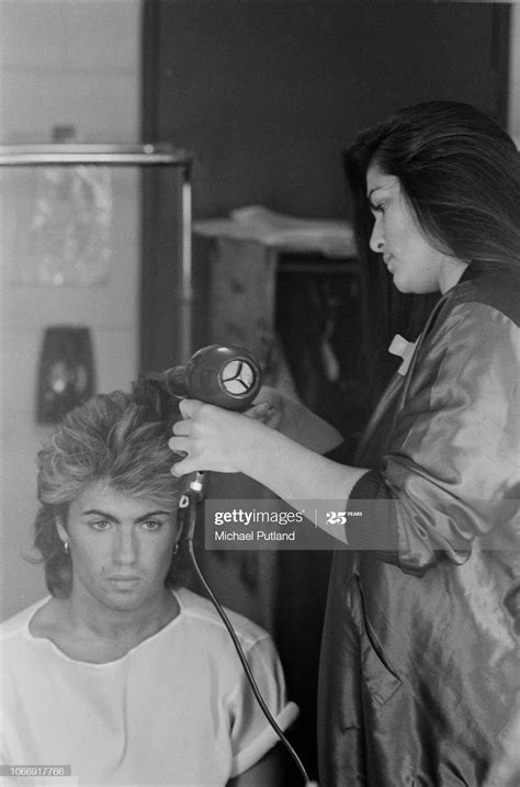 British singer songwriter george michael of wham pictured changing ...