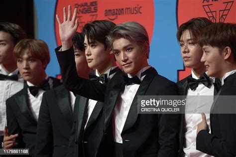 Members of the South Korean boy group NCT 127 pose on the red carpet... News Photo - Getty Images