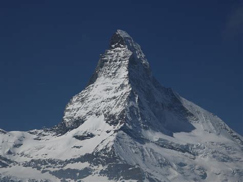 Spiky Snowcapped Mountain Top · Free Stock Photo