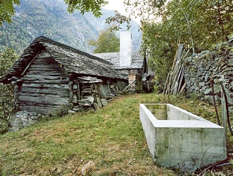 200-year-old stone structure hides a modern and minimalist summer home ...