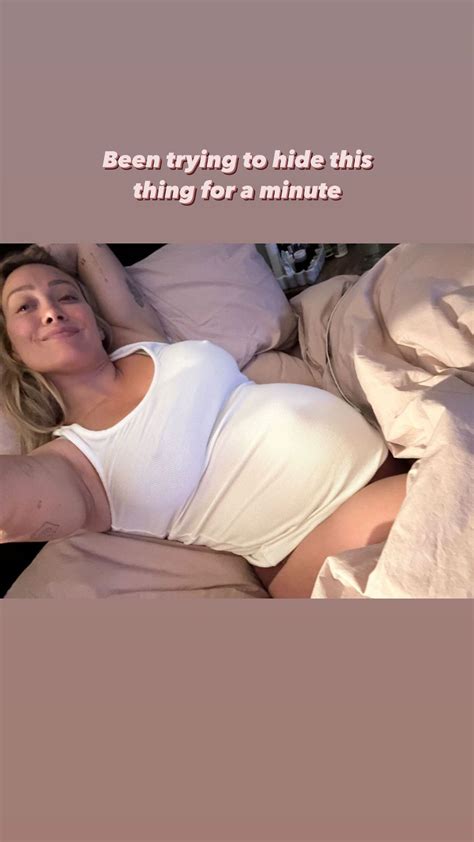 Hilary Duff flaunts baby bump in top for selfie in bed and admits she's been 'trying to hide ...