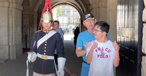 Heartwarming Moment King's Guard Breaks Protocol to Pose for Photo | PetaPixel