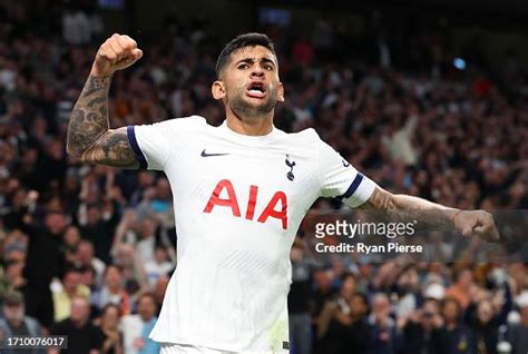 Cristian Romero of Tottenham Hotspur celebrates after Joel Matip of ...