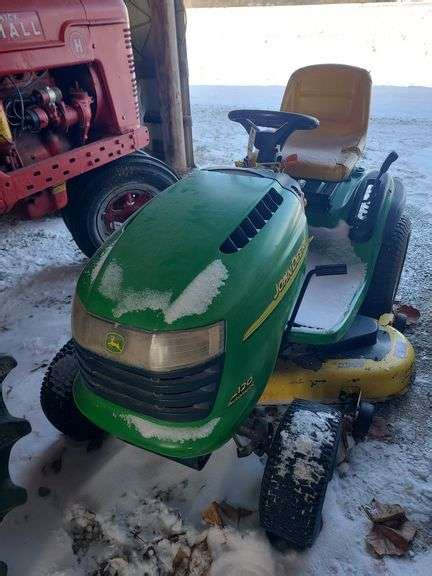 John Deere 120 auto lawn mower 491 hrs. 48" deck - Schmid Auction