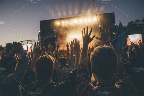 Crowd puts hands up at festival | Summer music festivals, Summer music, Edm festival