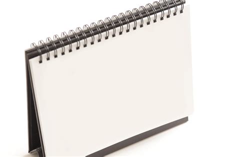 Free Image of Standing Blank Flip Chart on White Background | Freebie.Photography