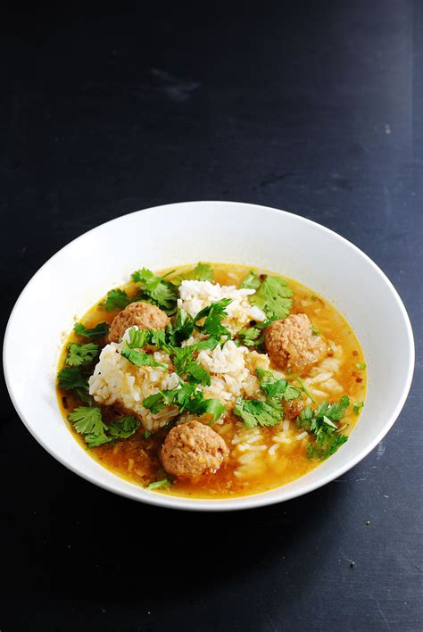 Thai rice soup with pork meatballs | white plate blank slate