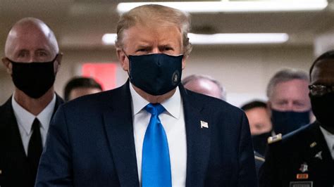 Trump finally wears face mask in public during hospital visit