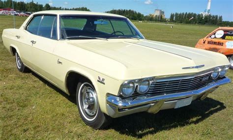 1965 Chevrolet Impala 4-door Sedan. Similar to my first car. Ah, the memories driving that old ...