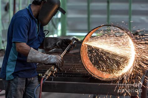 Metal cutting with acetylene torch Photograph by Sasin Tipchai - Fine Art America