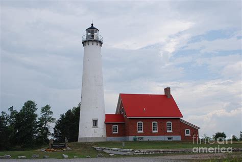 Tawas Point Lighthouse Photograph by Grace Grogan