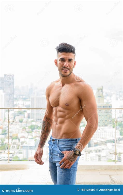 Happy Young Handsome Muscular Persian Man Smiling Shirtless Against View the City Stock Image ...