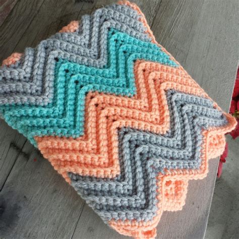 Crochet chevron baby blanket with holes for car seat straps