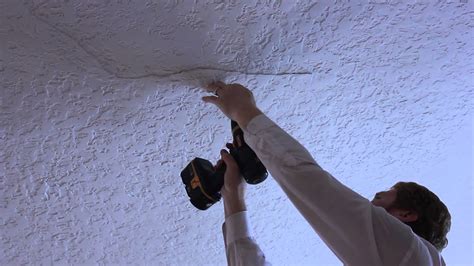 Ceiling plaster repair on a small buckling crack - YouTube